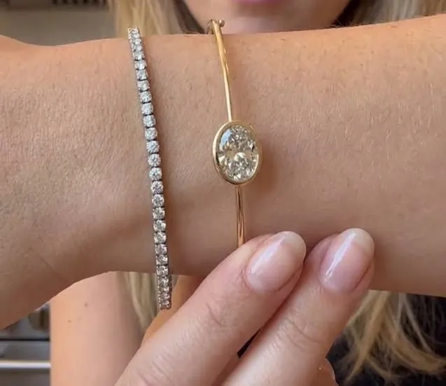 A line bracelet, and a bezel bangle
